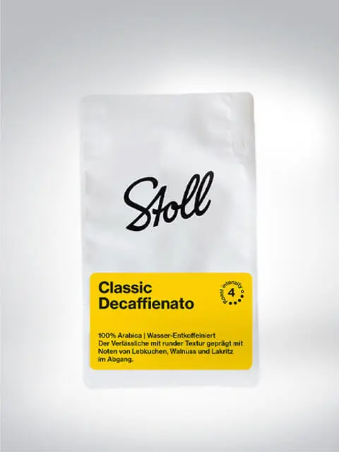 Emballage de café Stoll Classic Decaffeinato, 100% Arabica, décaféiné à l'eau, avec des notes de pain d'épices, noix et réglisse.