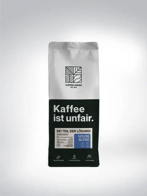 Verpackung des Coffee Annan House Blend mit der Aufschrift 'Kaffee ist unfair. Sei Teil der Lösung!'